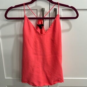 J. Crew coral colored flowy tank. Great condition. 100 silk.